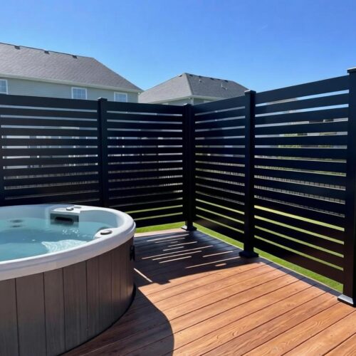 outdoor black aluminum privacy screens enclosing a hot tub in kitchener